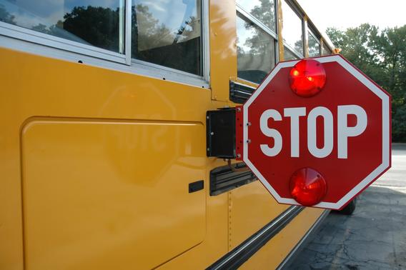 School bus with stop sign engaged